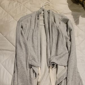 It's a long, grey, active sweater. It's from Old Navy and it's a medium.